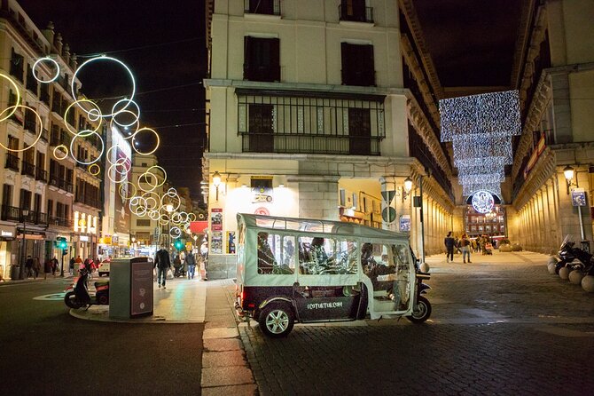 Christmas Lights Tour of Madrid in Eco Tuk Tuk Private - Puerta de Alcalá and the Salamanca streets in light
