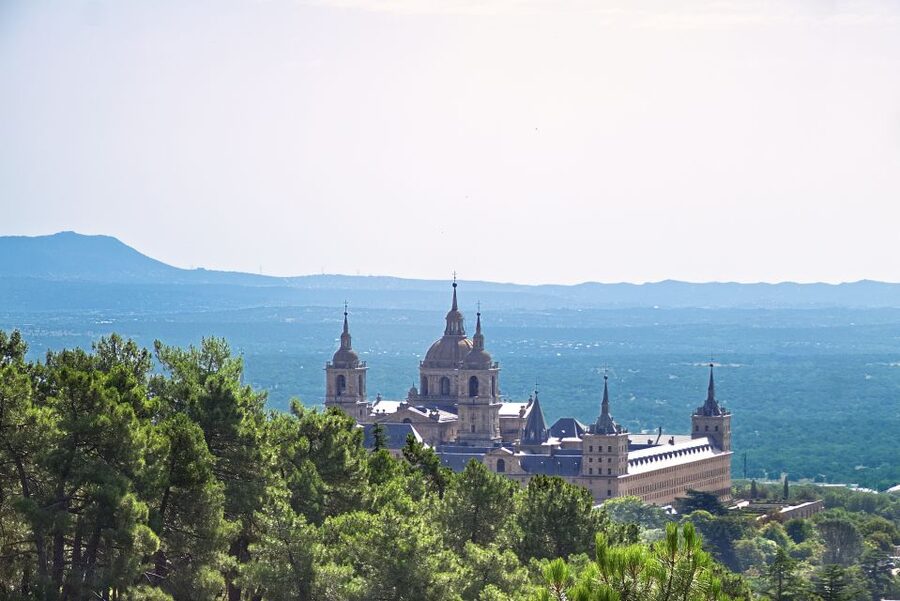 From Madrid: El Escorial and Valley's Basilica Half Day Tour - Valley of the Fallen: the 150-meter cross, basilica, and crypt setting