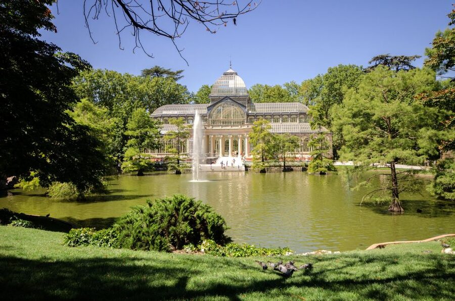 Madrid City Guided Bike/E-Bike Tour for Small Groups - Retiro Park: Palacio de Cristal, boating lake, and spring rose garden