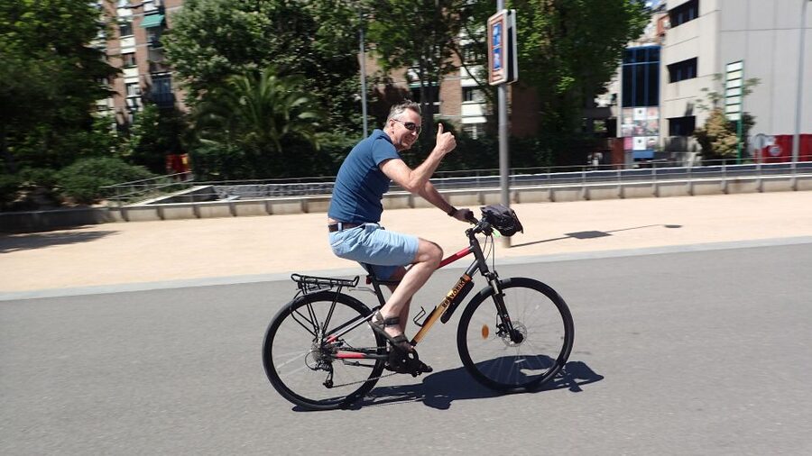 Madrid City Guided Bike/E-Bike Tour for Small Groups - Exiting Retiro at Alcalá Gate, then Chueca and Malasaña for the local flavor