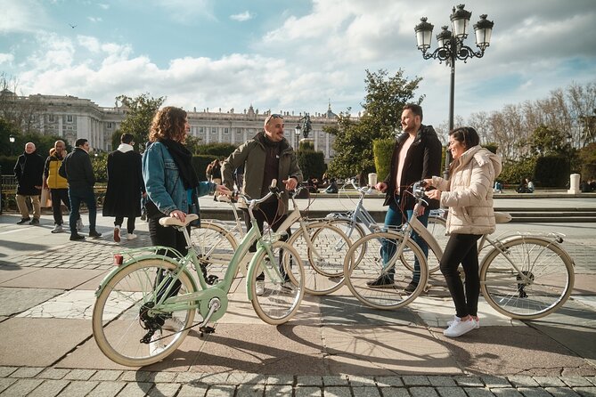Madrid: City Highlights Guided Vintage Bike Tour - Meeting at C. del Espejo and how the ride pacing feels