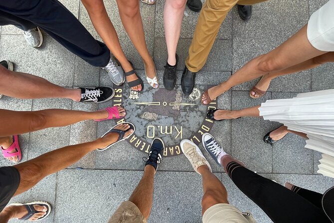 Madrid Essential: Historic Center, Plaza Mayor & Royal Palace - Getting Your Bearings at Puerta del Sol and Km 0