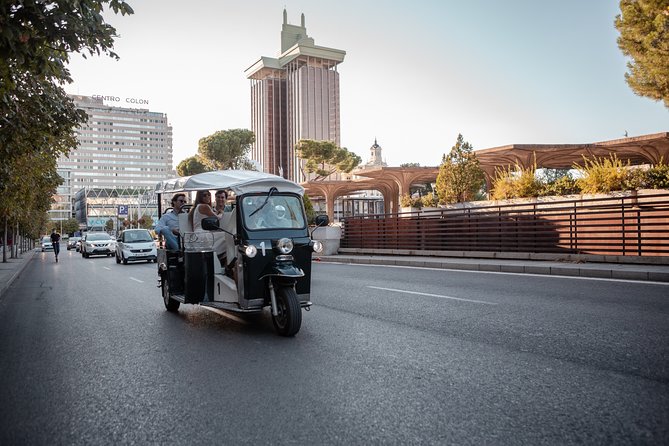 Madrid Expert Tour with Local Guide in Eco Tuk Tuk Private - Madrid’s big monuments: stadium, Columbus, libraries, and fountains