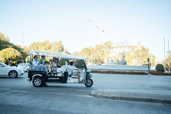 Madrid Express Tour with Local Guide in Eco Tuk Tuk Private - Sightlines, weather gear, and the reality of taking photos