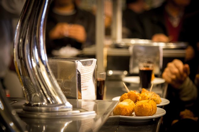 Madrid Local's Tapas Tour Dinner with a side of History - A 3.5-hour Madrid tapas night with history you can point at