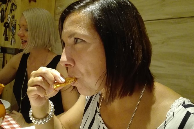 Madrid Local's Tapas Tour Dinner with a side of History - Puerta del Sol: 1800s time-square energy and the 12 grapes tradition