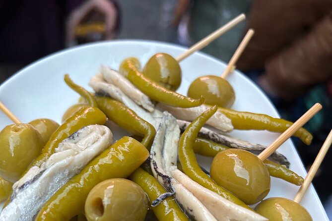 Madrid Local Tapas Tour with Private Dinner and Bottomless Wine - Key Highlights to Look For