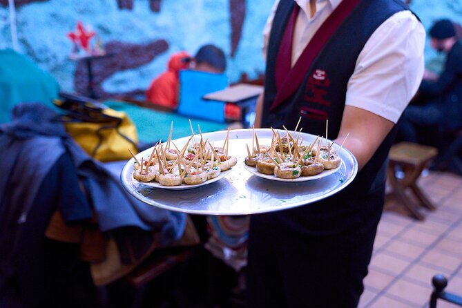 Madrid: Not Just Another Tapas & Wine Tour by Eating Europe - La Campana and La Trucha, where the night’s variety shows up