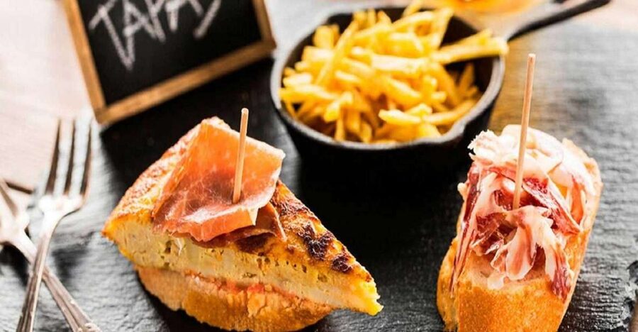Madrid: Old Madrid Walking Food and Wine Tour - Starting at Puerta del Sol, the easiest way to get your bearings
