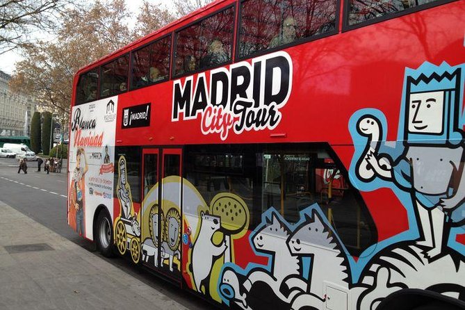 Madrid Panoramic City Bus Tour - Walking tour add-on, flamenco drink, and discount vouchers