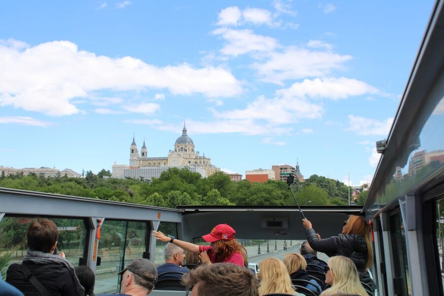 Madrid: Panoramic Open-Top Bus Day or Night Tour with Guide - Photos: what you can do from a moving bus