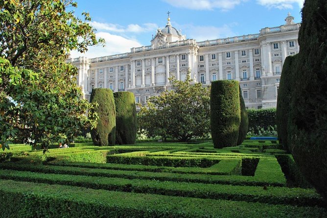 Royal Palace Guided Tour Small Group with Tickets - The short Madrid walk ending near the Prado